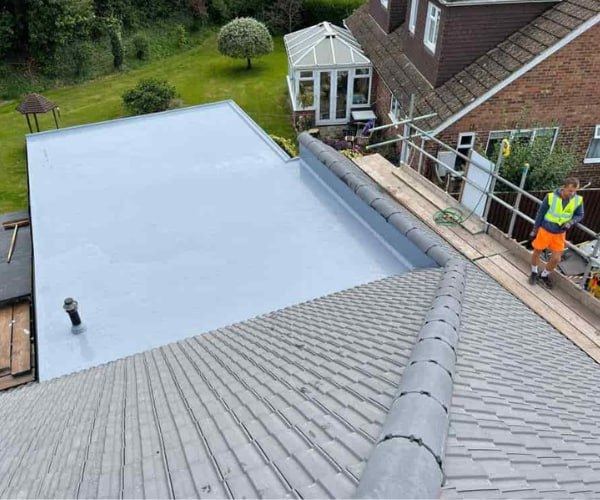 This is a photo of a newly installed hip roof, with a combined liquid covered flat roof. Work carried out by LPO Roofing Kempston