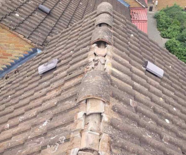 This is a photo if a roof ridge which has missing tiles. The ridge tiles are being replaced by LPO Roofing Kempston